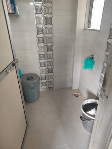 Bathroom in 1 BHK Apartment at Kanchan Pushp Society, Ghodbunder Road – for Rent