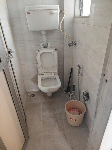 Bathroom in 1 BHK Apartment at Kanchan Pushp Society, Ghodbunder Road – for Rent