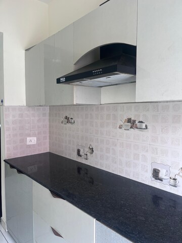Kitchen in 2 BHK Apartment at Windlass River Valley, Harrawala – for Rent