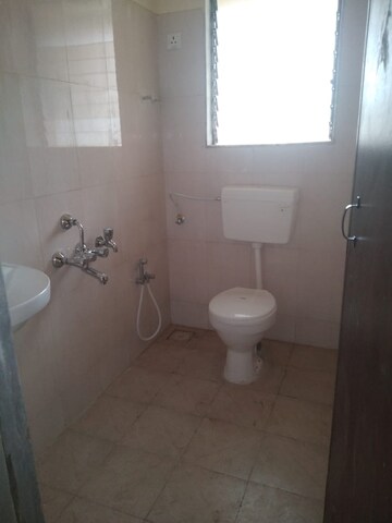 Bathroom in 1 BHK Apartment at Paradigm Zenith Pushpanjali Residency Phase III, Ghodbunder Road – for Rent