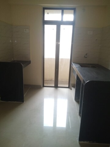 Kitchen in 1 BHK Apartment at Paradigm Zenith Pushpanjali Residency Phase III, Ghodbunder Road – for Rent