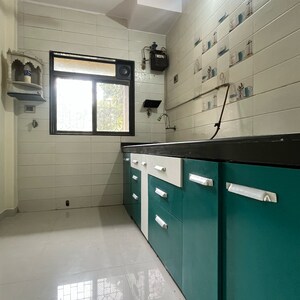 Kitchen in 1 BHK Apartment at Brahamand Phase 6 Chs Ltd, Brahmand – for Sale