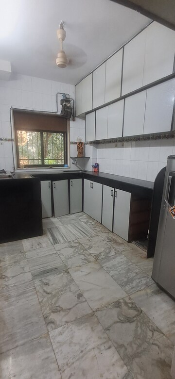 Kitchen in 2 BHK Apartment at Ahimsa Tower, Malad West – for Rent