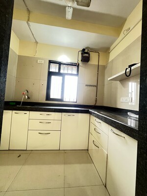 Kitchen in 1 BHK Apartment at Dosti Desire Joy, Brahmand – for Sale