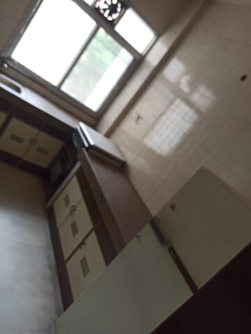 Kitchen in 2 BHK Apartment at Magarpatta Nova Residency, Mundhwa – for Rent