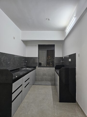 Kitchen in 2 BHK Apartment at Wakadkar Stellar Rhythmm, Wakad – for Rent
