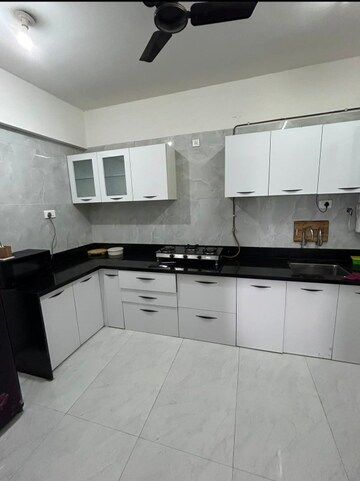 Kitchen in 2 BHK Apartment at Eden Garden CHS, Viman Nagar – for Rent