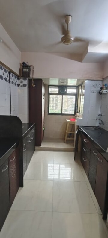 Kitchen in 1 BHK Apartment at Pooja Enclave Kandivali, Kandivali West – for Rent