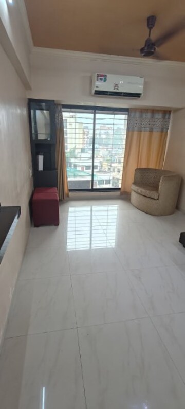 Living Room in 1 BHK Apartment at Pooja Enclave Kandivali, Kandivali West – for Rent