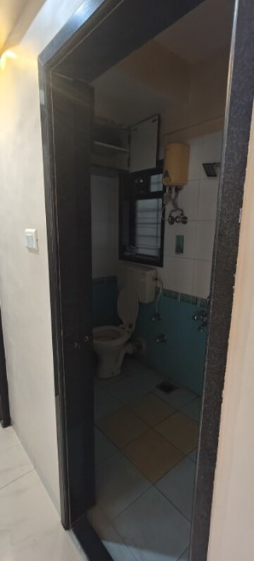 Bathroom in 1 BHK Apartment at Pooja Enclave Kandivali, Kandivali West – for Rent