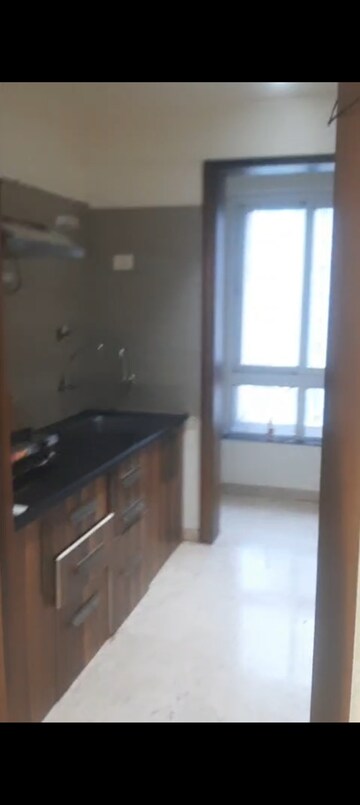 Kitchen in 1 BHK Apartment at Puranik Rumah Bali, Ghodbunder Road – for Rent