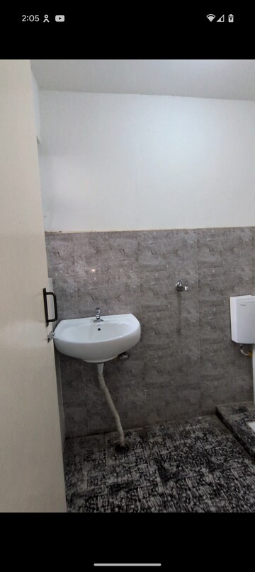Bathroom in Studio Apartment at Aditya Vrinda Homes Phase 2, Shahpur Bamheta – for Rent