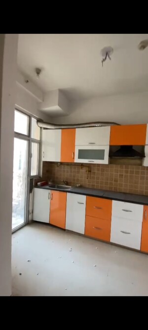 Kitchen in 3 BHK Apartment at Mahagun Mywoods, Sector 16c Greater Noida – for Sale