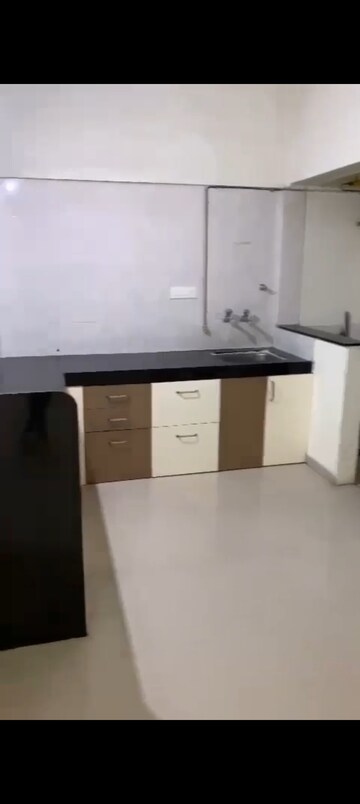 Kitchen in 2 BHK Apartment at Ayaan Society , Wagholi – for Rent