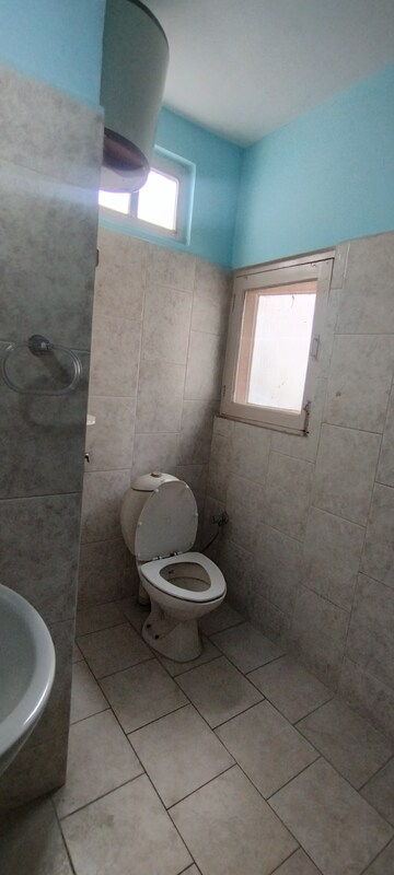 Bathroom in 4 BHK Builder Floor at Sector 14 – for Rent