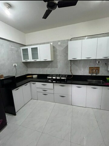 Kitchen in 3 BHK Apartment at Nirman Adi, Kalyani Nagar – for Rent