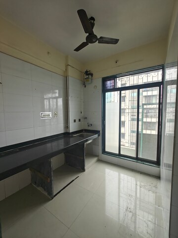 Kitchen in 1 BHK Apartment at Geetanjali Heights, Seawoods – for Rent