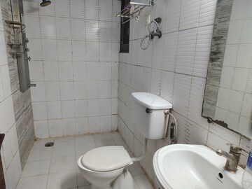 Bathroom in 2 BHK Apartment at Gaurs Green Vista, Nyay Khand – for Rent