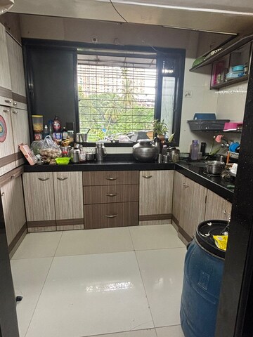 Kitchen in 1 BHK Apartment at Topiwala CHS, Goregaon West – for Sale