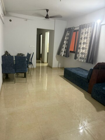 Living Room in 2 BHK Apartment at Lodha Palava Downtown, Dombivli East – for Rent