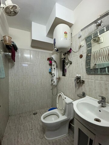 Bathroom in 2 BHK Apartment at Greenfield Heights, New Town – for Rent