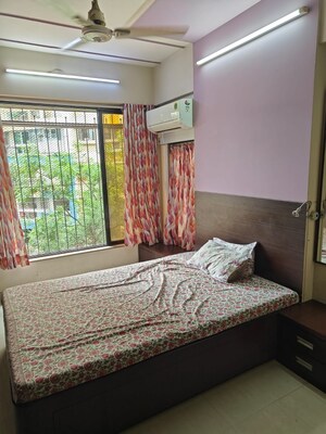 Bedroom in 3 BHK Apartment at Virmati Villa CHS, Borivali West – for Sale