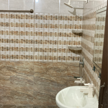 Bathroom in 3 BHK Independent House at RWA Apartments, Nithari Village – for Rent