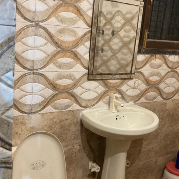 Bathroom in 3 BHK Independent House at RWA Apartments, Nithari Village – for Rent