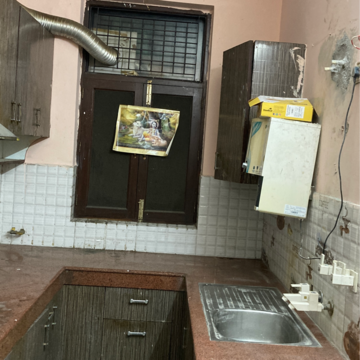 Kitchen in 3 BHK Independent House at RWA Apartments, Nithari Village – for Rent