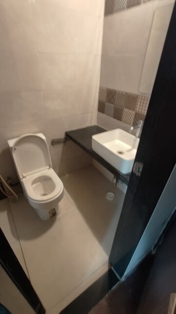 Bathroom in 2 BHK Apartment at Acme Stadium View, Andheri West – for Rent