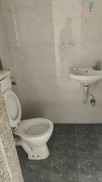 Bathroom in 2 BHK Apartment at Acme Stadium View, Andheri West – for Rent