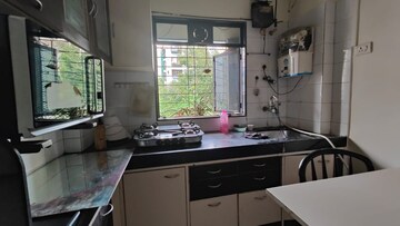 Kitchen in 2 BHK Apartment at Sheth Auris Serenity Tower 1, Malad West – for Rent
