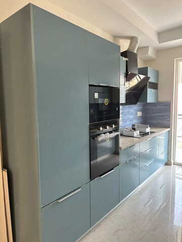 Kitchen in 4 BHK Builder Floor at Ansal API Versalia, Sector 67a – for Sale