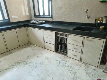 Kitchen in 2 BHK Apartment at Juhu Darshan CHS, Andheri West – for Rent