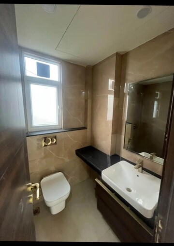 Bathroom in 3 BHK Apartment at Smart World Orchard, Sector 61 – for Rent