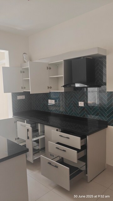 Kitchen in 2 BHK Apartment at Puravankara Purva Zenium, Hosahalli – for Rent