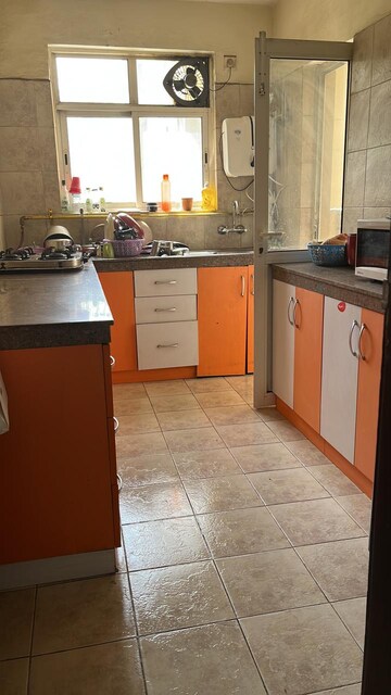 Kitchen in 4 BHK Apartment at 3C Lotus Boulevard, Sector 100 – for Rent