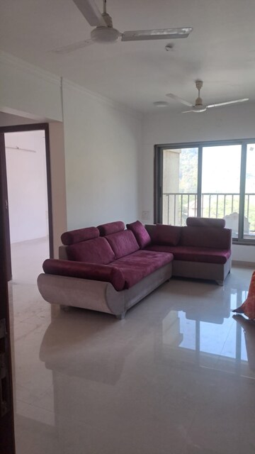 Living Room in 2 BHK Apartment at Nilgiri Upvan CHS, Gawand Baug – for Rent