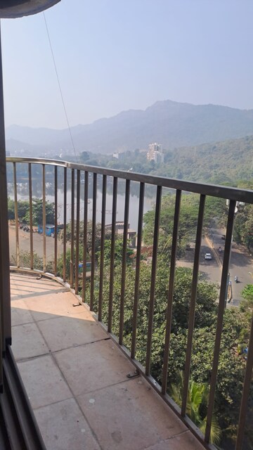Balcony in 2 BHK Apartment at Nilgiri Upvan CHS, Gawand Baug – for Rent