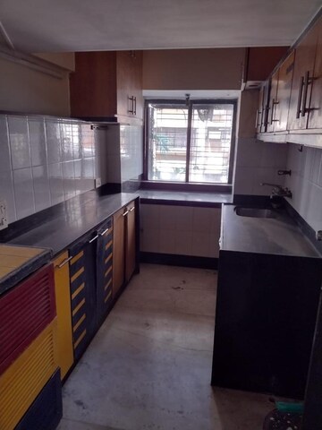 Kitchen in 2 BHK Apartment at Andheri CHS, Andheri West – for Rent