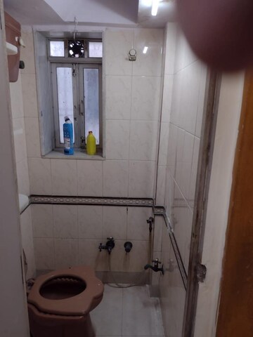 Bathroom in 2 BHK Apartment at Andheri CHS, Andheri West – for Rent