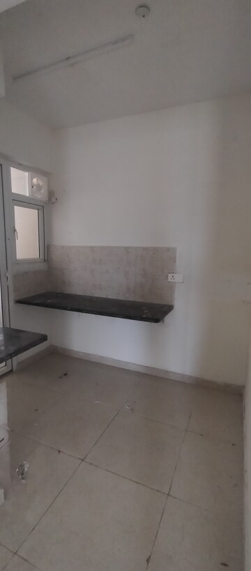 Kitchen in 2 BHK Apartment at Signature The Millennia 2, Sector 37d – for Rent