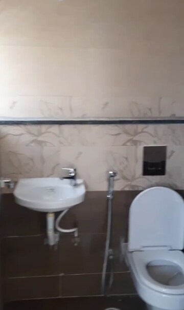 Bathroom in 3 BHK Apartment at Silpa RV dharmista, Miyapur – for Rent