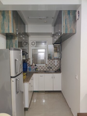 Kitchen in 2 BHK Apartment at Ajnara Homes, Sector 16b Greater Noida – for Rent