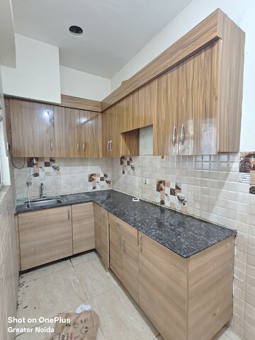 Kitchen in 1 RK Apartment at Gaur City 2 - 14th Avenue, Sector 16c Greater Noida – for Rent
