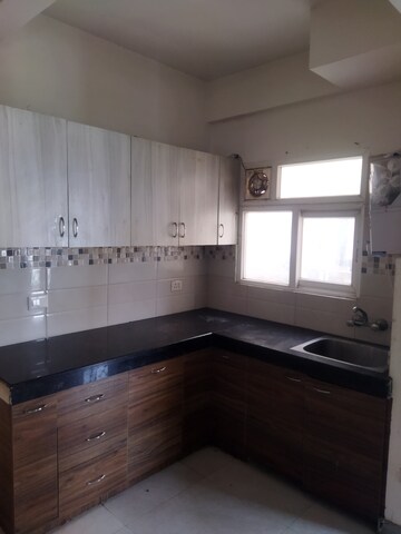Kitchen in 2 BHK Apartment at Signature Global Orchard Avenue, Sector 93 – for Rent