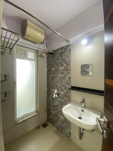 Bathroom in 2 BHK Apartment at Deepak Residency, Vile Parle West – for Rent