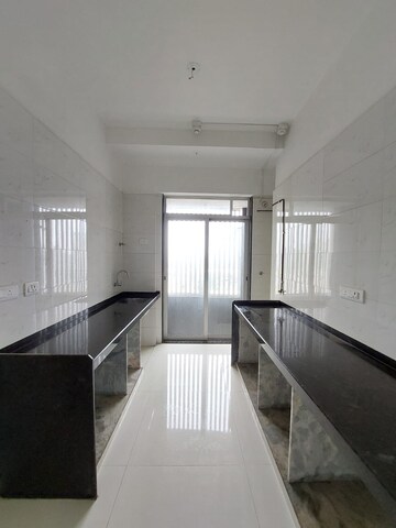 Kitchen in 3 BHK Apartment at Deepak Residency, Vile Parle West – for Rent