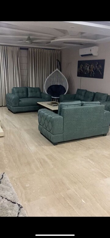Living Room in 4 BHK Apartment at South City 1 – for Sale