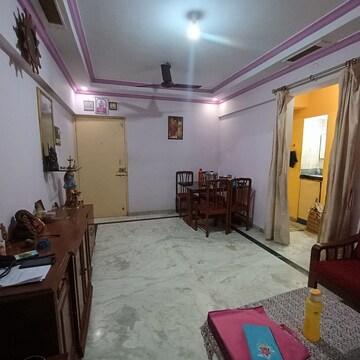 Living Room in 2 BHK Apartment at Olive Complex, Seawoods – for Sale